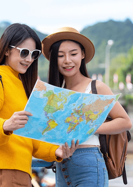 Travelers reading map